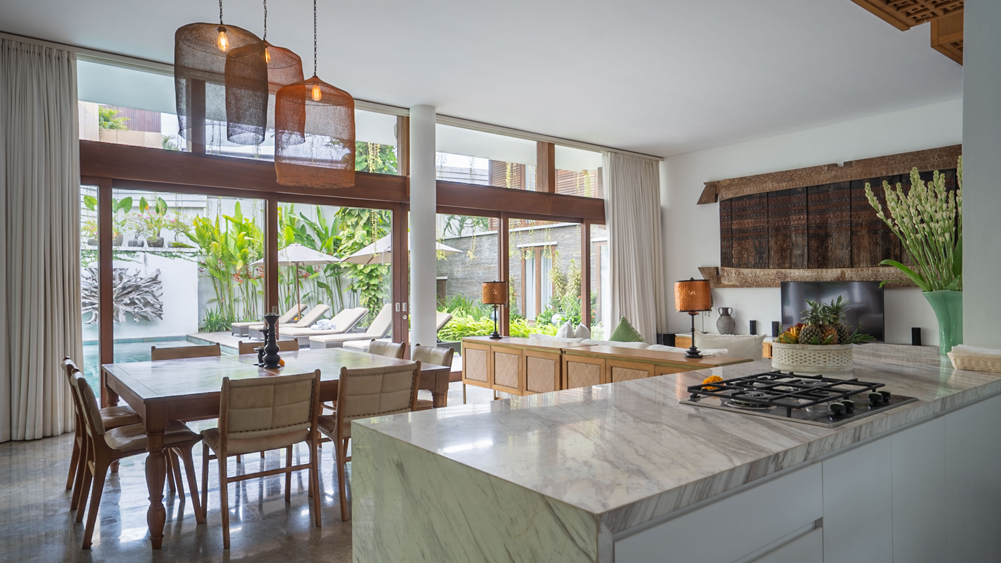 Elite Havens - Villa Indrani - Canggu - Bali - Indonesia - Living and dining area by the pool